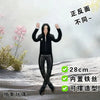 A black plush doll resembling Michael Jackson in a standing pose, displayed against a snowy background.