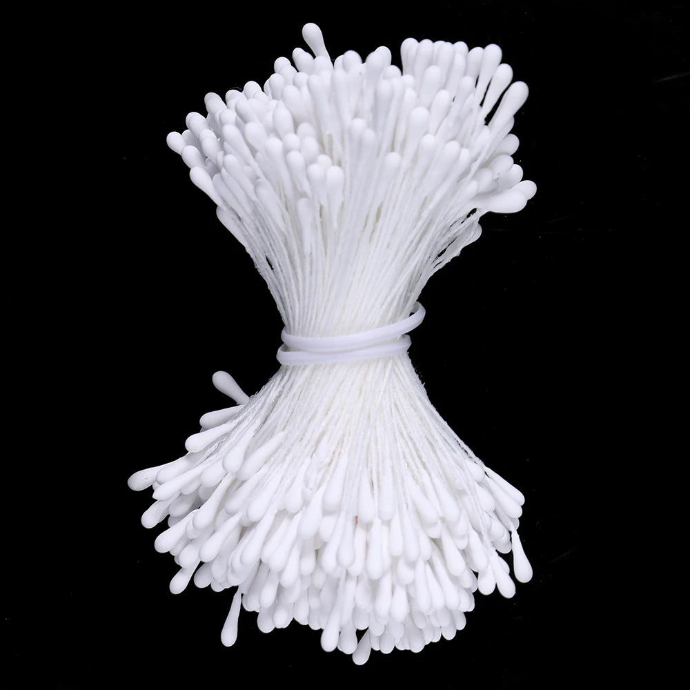 A bundle of white mini artificial flower stamens or pistils used for DIY decoration.