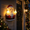 A glowing Santa Claus night light with a beard making a middle finger gesture, mounted on a wall.