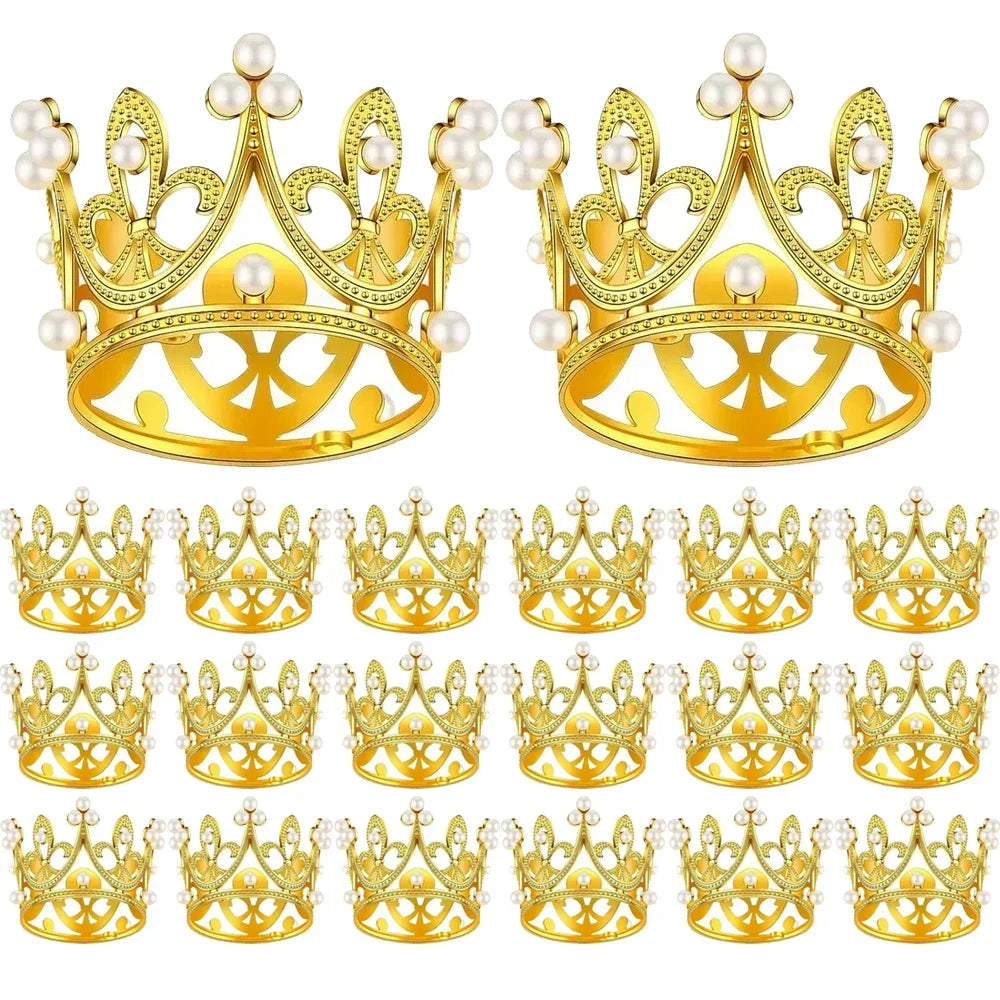 A set of gold and pearl mini crown cake toppers and decorations for weddings and birthdays