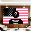 A large tapestry featuring a patriotic design with stars and stripes in black, white, and pink.