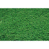 Vibrant green artificial turf or grass texture used as a photography backdrop.