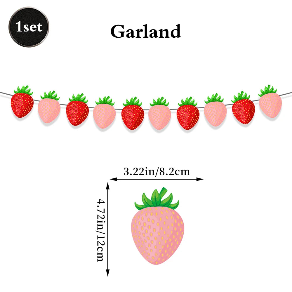 A string of pink strawberry-shaped decorations used for a garland or banner.