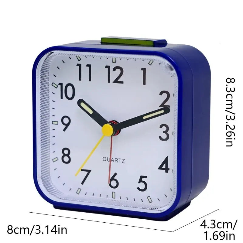 A blue digital alarm clock with a white face showing the time, featuring a night light and snooze function.