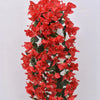 A vertical arrangement of vibrant red faux bougainvillea vine flowers.