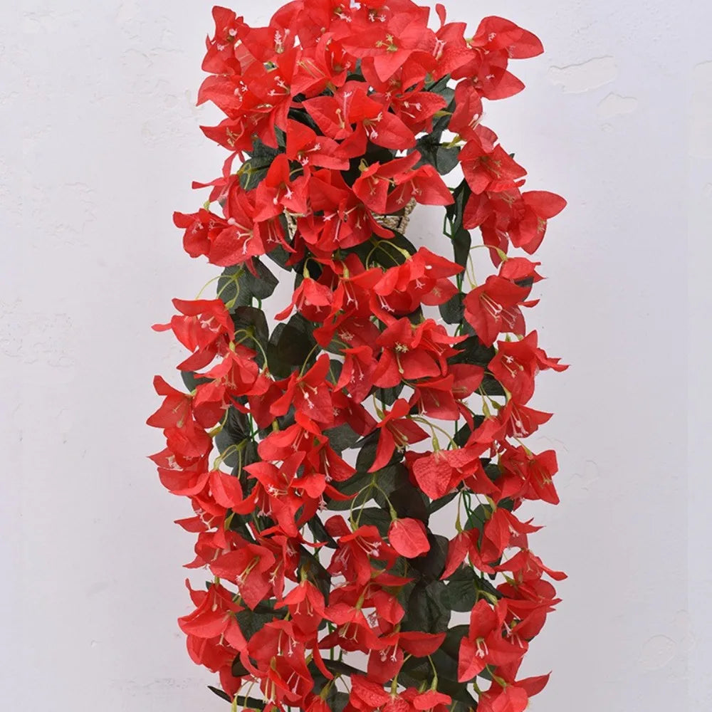 A vertical arrangement of vibrant red faux bougainvillea vine flowers.