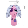 A pink plush toy with striped hair and colorful patches on its body.