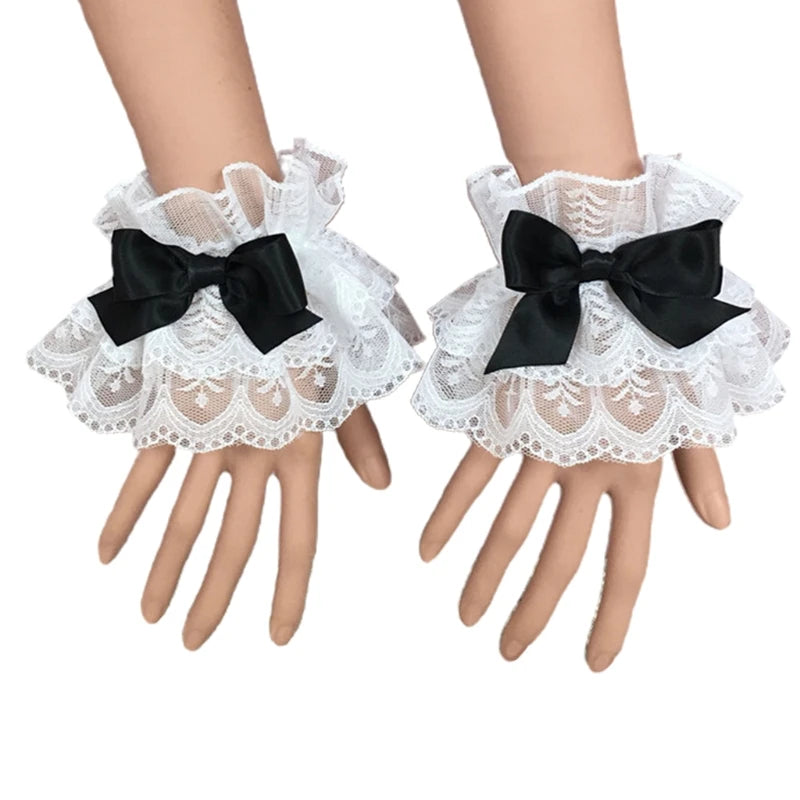 Pair of white ruffled lace wrist cuffs with black bowknot accents