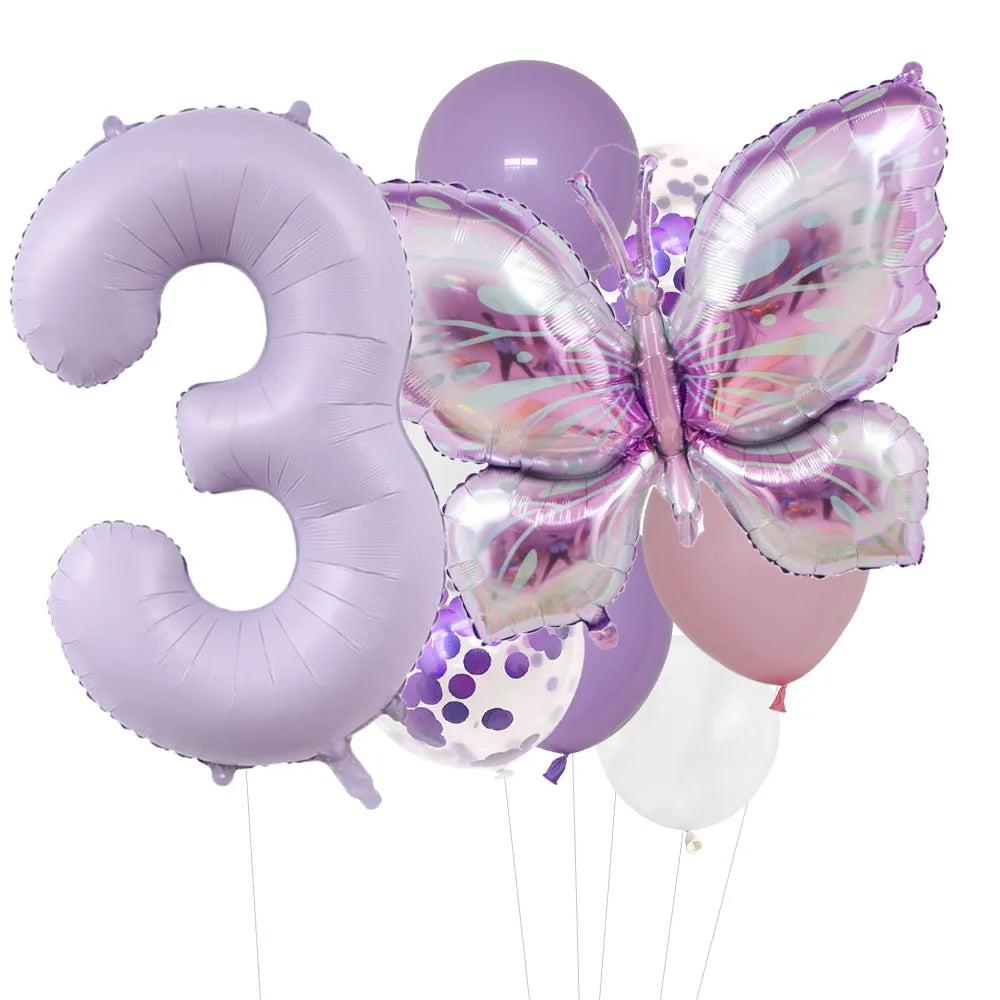 A set of purple foil balloons shaped like the number three and a butterfly