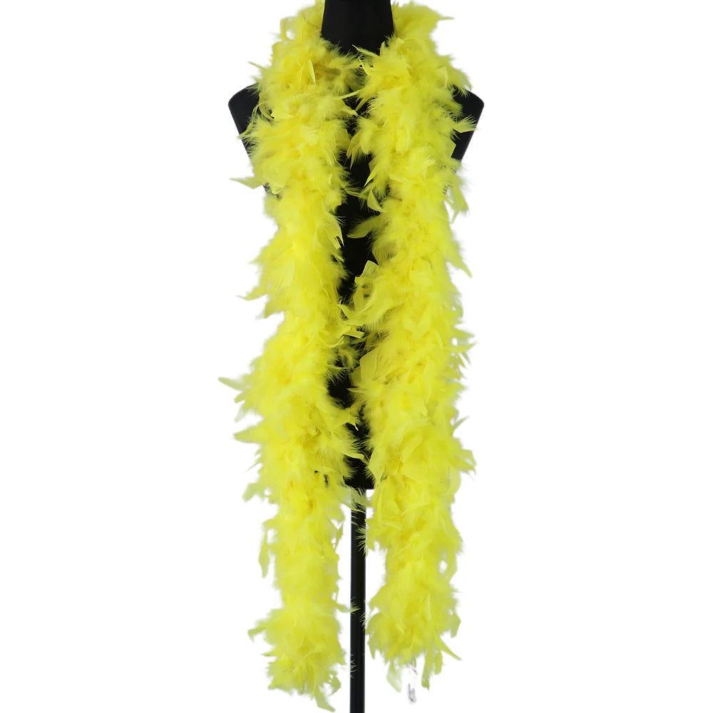 Yellow natural turkey feather boa displayed on a black hanger.