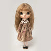 A vintage lace pajama set for a 1/6 doll featuring floral fabric and a ruffled collar.