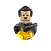 A minifigure of a horror movie icon with black hair and facial scars holding a black weapon.