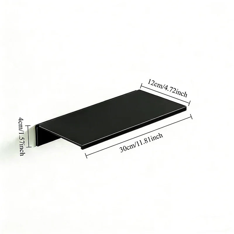 A black aluminum floating wall shelf with dimensions 12cm by 30cm.
