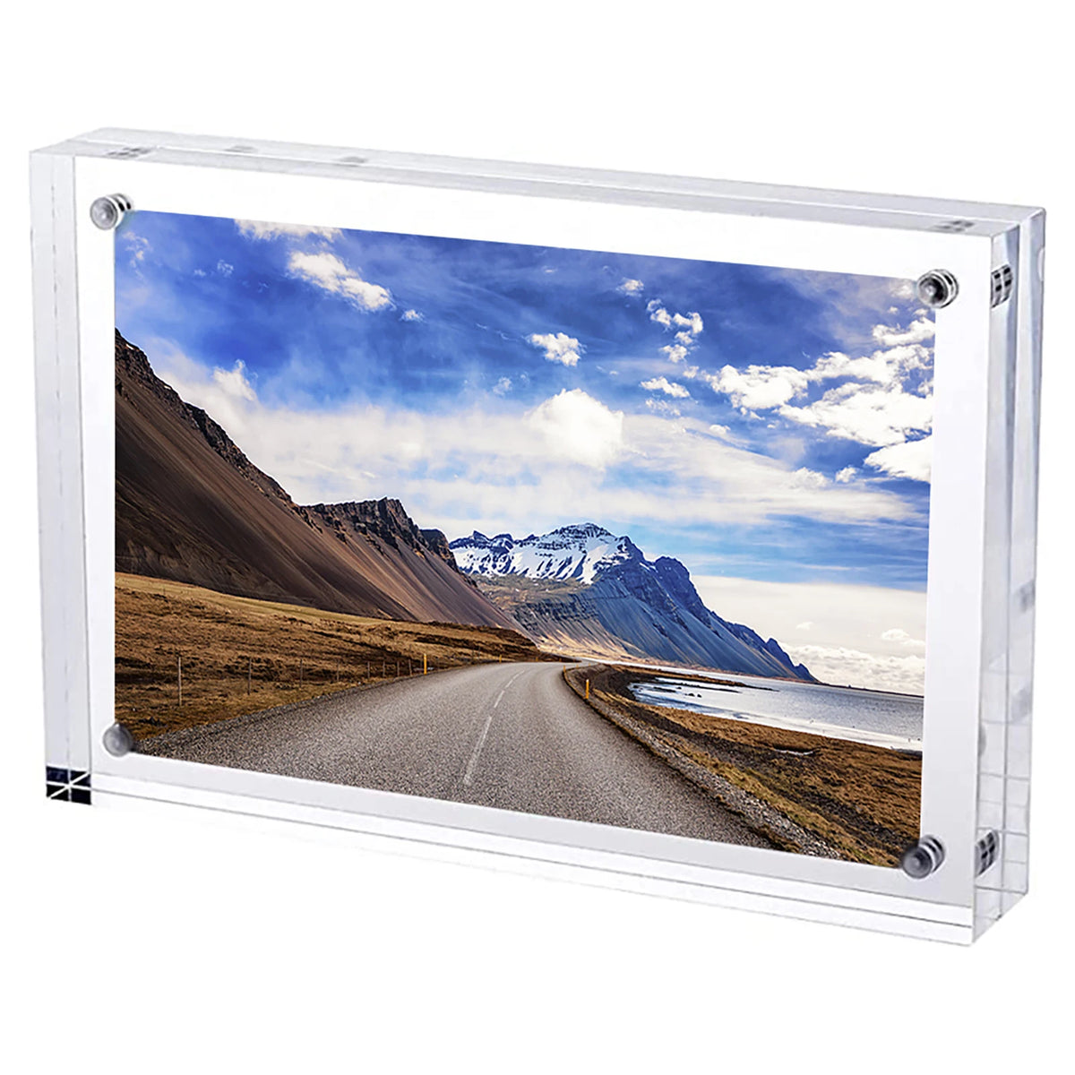 A clear acrylic magnetic photo frame displaying a scenic landscape of mountains and a road.