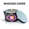 A massage candle in a tin with a lavender scent and a silver lid