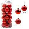 A box containing 24 festive red and glitter Christmas tree ornament balls.