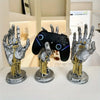 A gray hand model is displayed next to a black gamepad controller, illustrating a 3D gamepad and controller storage organizer