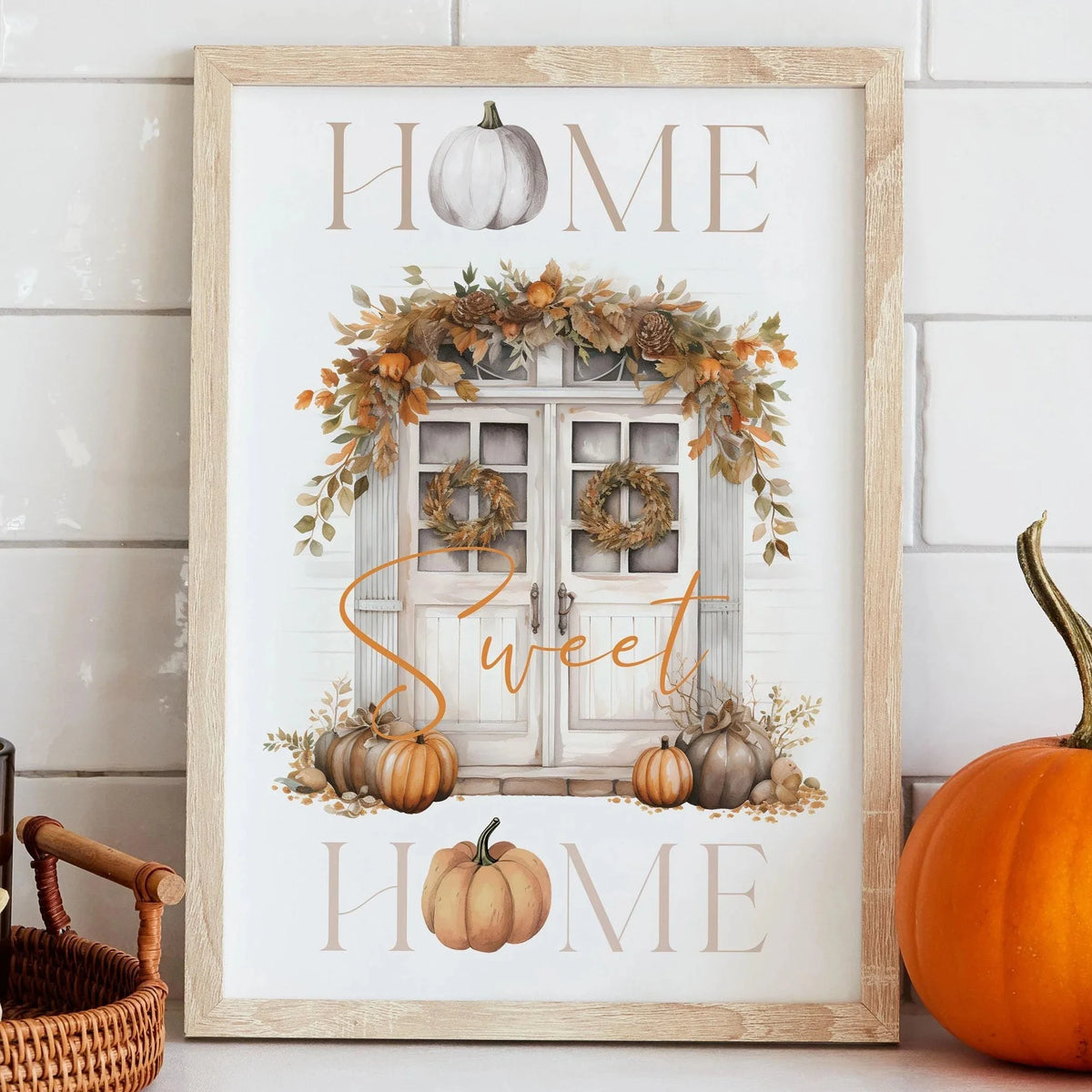 Wall art poster featuring a rustic wooden door decorated with autumn foliage and pumpkins, with the words HOME Sweet HOME.
