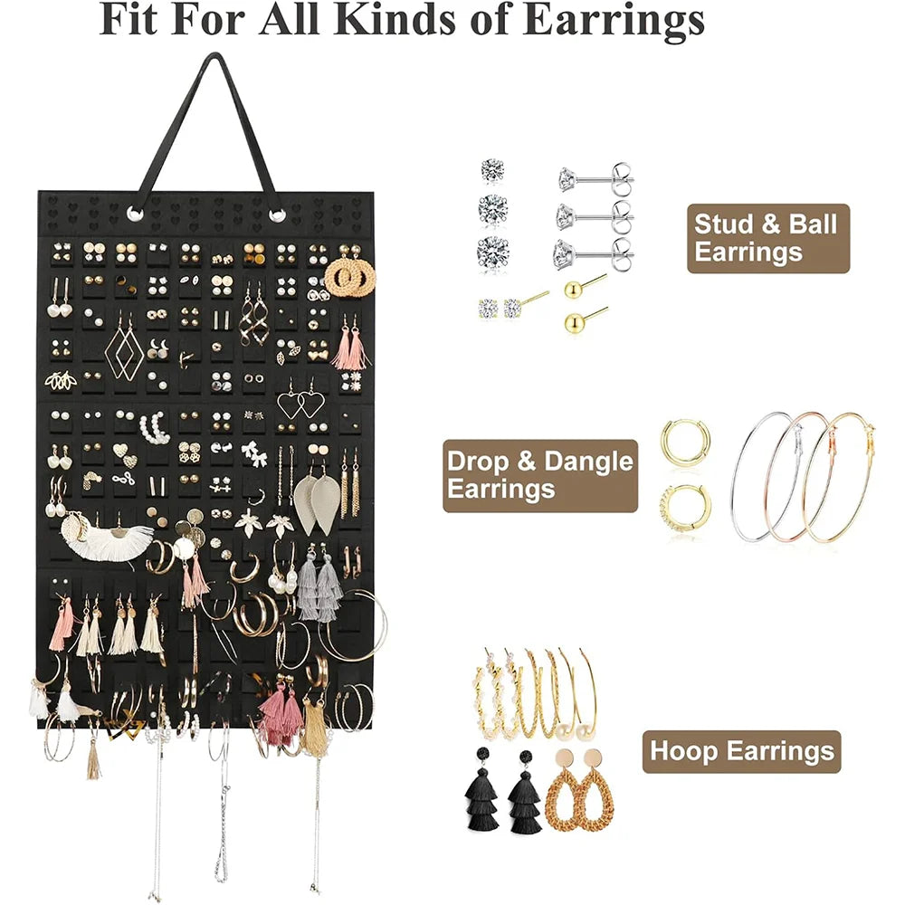 Black felt wall mounted organizer display showing various types of earrings including stud, ball, drop and dangle, and hoop s