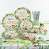 A green and white jungle safari themed tableware set featuring animal prints for a birthday party.
