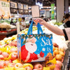 Festive Christmas tote bags featuring Santa Claus designs displayed among fresh fruit.