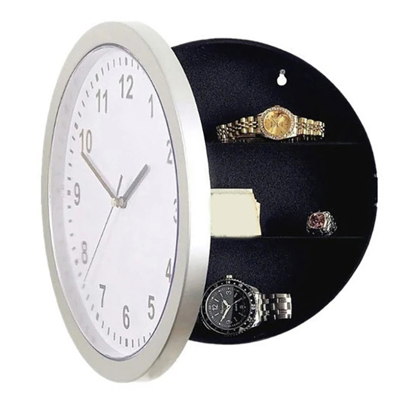 A silver-rimmed watch display box with a black lid showing several gold and silver watches.