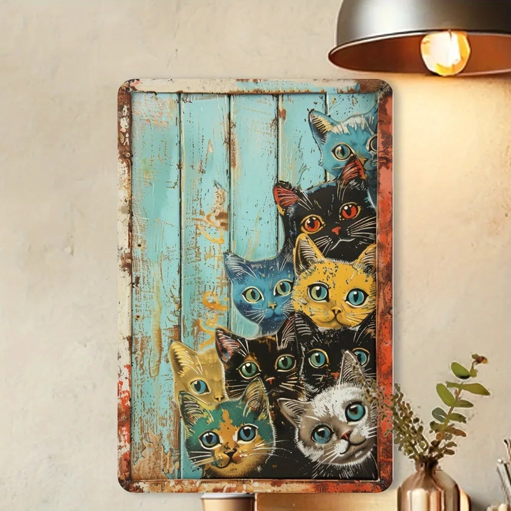 A vintage metal tin sign featuring multiple cats in various expressions against a distressed teal background.