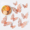 Several orange-toned, intricate 3D butterfly wall stickers are displayed on a white background.