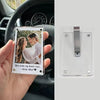 A hand holds a photo clip featuring a couple and the text You make my heart race drive slow for interior decor.
