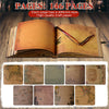 An open vintage scrapbook photo album showing 146 pages of different style kraft paper.