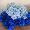 A large bouquet of silk roses in various shades of blue, including light blue and deep blue.
