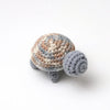 Handmade crocheted turtle plush in shades of brown and gray