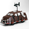 A detailed model of a Storm Chaser Tornado Interceptor armored car, painted brown and white, with an antenna on top.