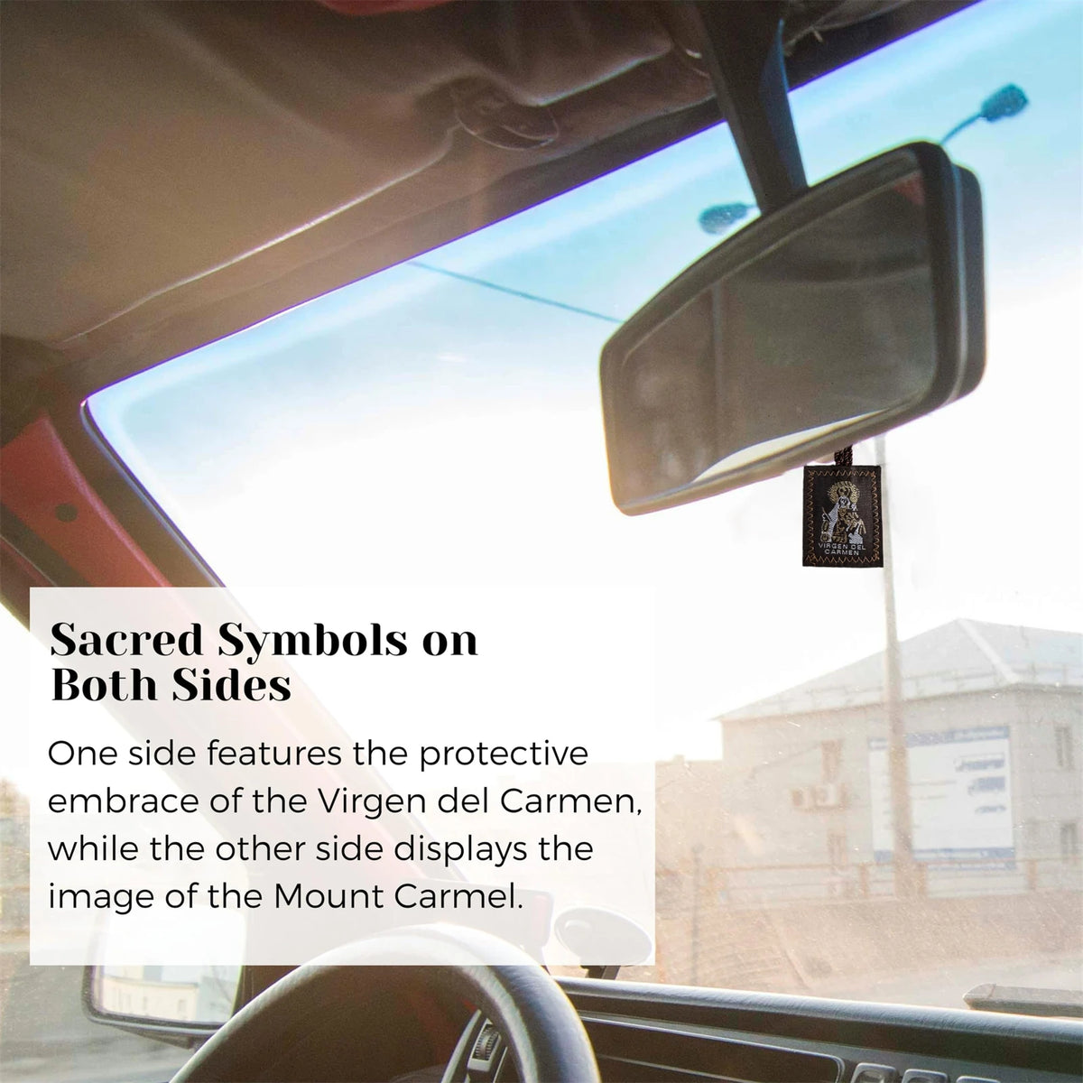 A rearview mirror inside a car shows sacred symbols on both sides of the vehicle.