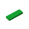 A rectangular, smooth green building brick.
