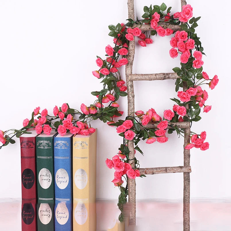 A rustic wooden trellis decorated with a lush garland of pink silk roses for wedding and home decor.