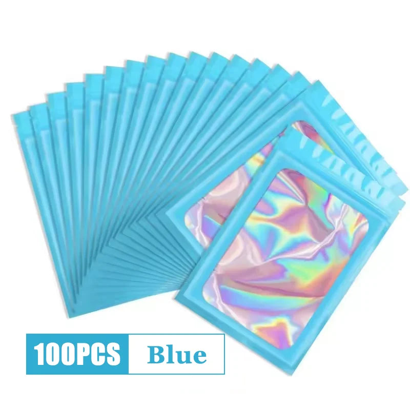 A stack of 100 blue holographic ziplock bags for jewelry and small item storage.