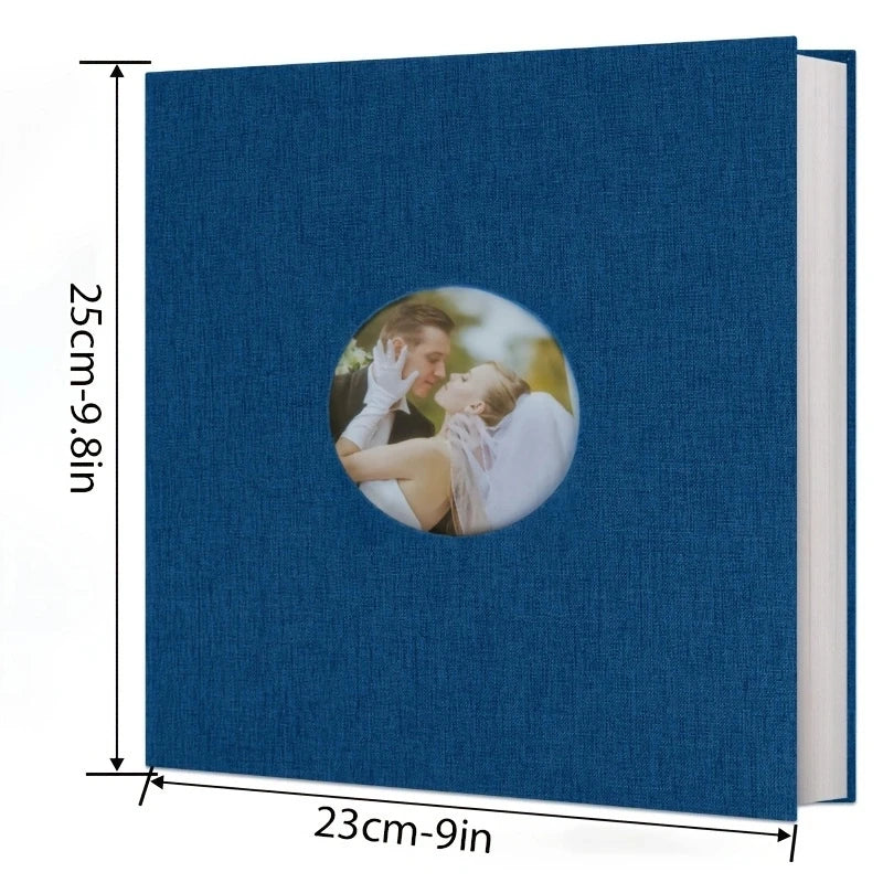 A dark blue magnetic scrapbook album with a circular photo holder featuring a couple.