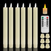 A set of six beige flameless LED taper candles, including one lit candle and a control panel.