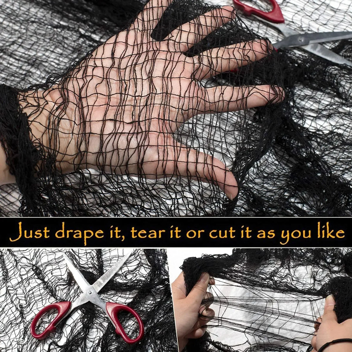 A hand is tearing or cutting black creepy gauze cloth for Halloween decor.