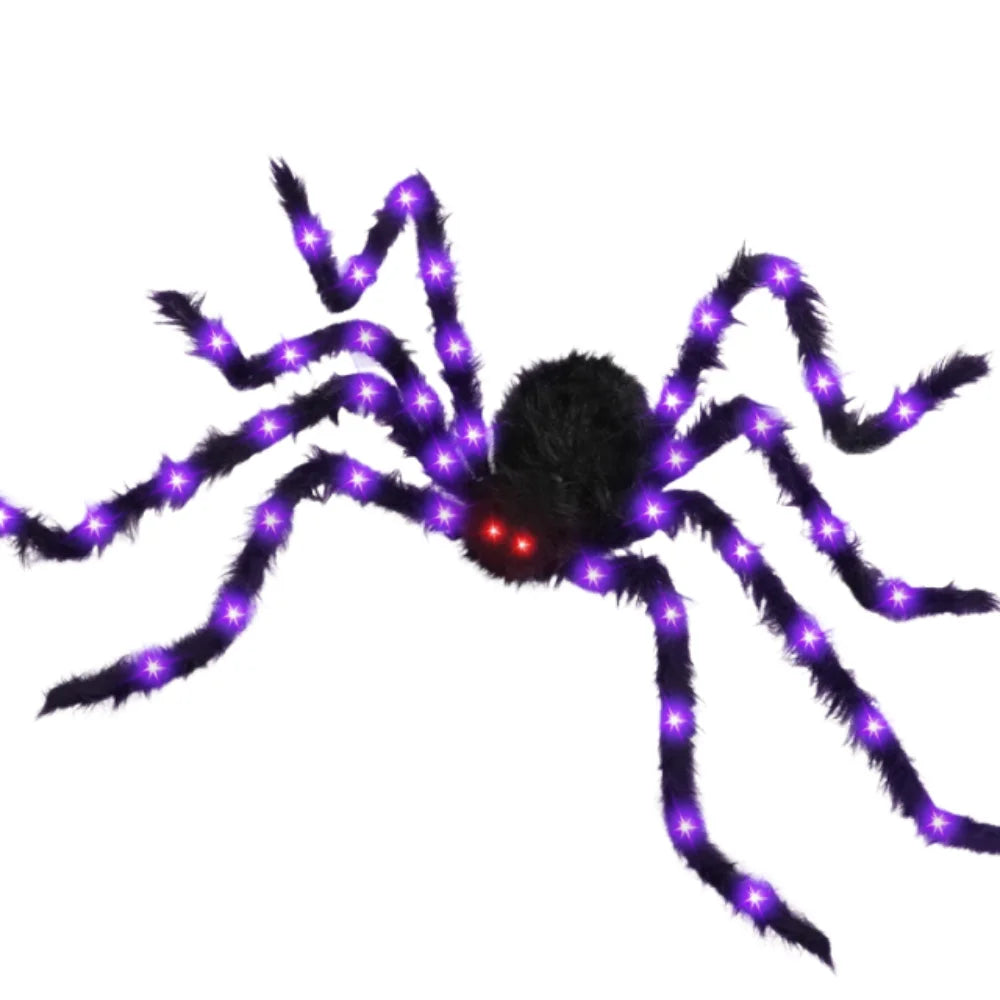 A black Halloween spider with glowing purple LED strands forming a web.
