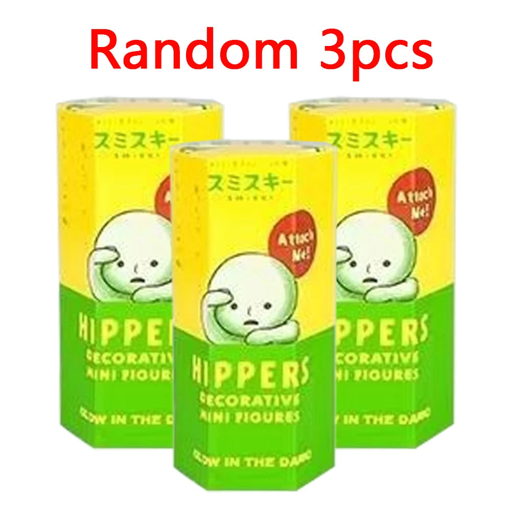 Three glow-in-the-dark blind box figures of Hippers anime animals in yellow and green packaging
