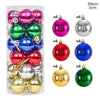 A collection of 24 festive Christmas baubles in various colors including pink, green, silver, blue, and red.