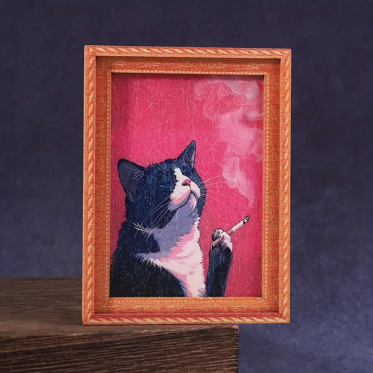A framed watercolor painting of a black and white cat smoking a cigarette.