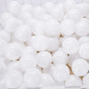 A large quantity of white, glossy, spherical balls for play areas and ball pits.