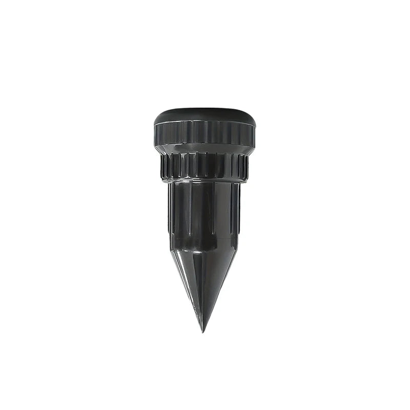Black realistic watering can key hider designed for outdoor security.
