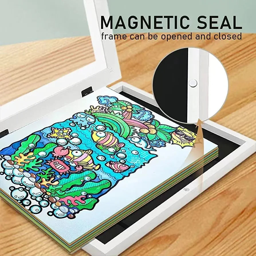 A white magnetic seal frame is shown open, displaying colorful underwater art inside.