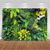 A lush green tropical palm leaf backdrop featuring various ferns and foliage for party decor.