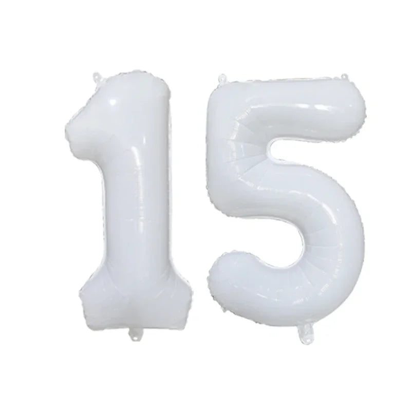 Two white helium foil number balloons shaped like 1 and 5.
