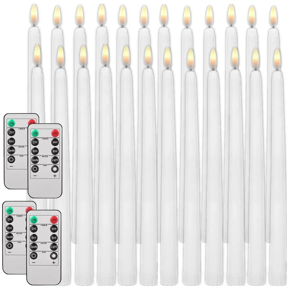 A collection of white flameless LED taper candles with remote timers displayed in a row.